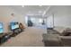 Finished basement game room with two gaming chairs and TVs at 41860 Muirfield Loop, Elizabeth, CO 80107