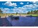 Spacious patio with seating area and fire pit, perfect for outdoor entertaining at 41860 Muirfield Loop, Elizabeth, CO 80107