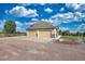Two-car attached garage with driveway at 41860 Muirfield Loop, Elizabeth, CO 80107