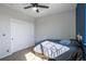 Bright bedroom with double doors and a comfortable bed at 41860 Muirfield Loop, Elizabeth, CO 80107