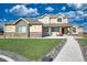 Two-story house exterior with stone and siding at 41860 Muirfield Loop, Elizabeth, CO 80107