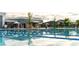 Resort-style pool with lap lanes and water features at 5561 Riverbend Ave, Firestone, CO 80504