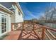 Back deck with wooden railings, overlooking the backyard at 1020 Lilac St, Broomfield, CO 80020