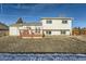 Rear view of house featuring a deck and spacious yard at 1020 Lilac St, Broomfield, CO 80020