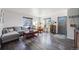 Living room with gray sectional sofa and wood floors at 1181 Yosemite St, Denver, CO 80220