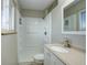 Clean bathroom with a shower/tub combo, sink, and vanity at 3601 Sunrise Ln, Brighton, CO 80603