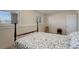 Basement bedroom with double bed and window at 3601 Sunrise Ln, Brighton, CO 80603