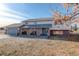 Ranch style home with brick accents and attached two-car garage at 3601 Sunrise Ln, Brighton, CO 80603