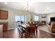 Dining area with a wooden table and chairs, near the kitchen at 42395 Forest Oaks Dr, Elizabeth, CO 80107