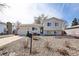 Ranch home with updated landscaping, rock garden, and a two-car garage at 1029 S Newark St, Aurora, CO 80012