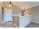 Bright entryway with modern light fixtures and flooring at 4170 S Richfield Way, Aurora, CO 80013