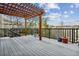 Relaxing deck with pergola and views, perfect for outdoor entertaining at 1563 Baguette Dr, Castle Rock, CO 80108