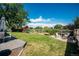 Large backyard with grassy area, playset and patio at 7311 W Weaver Pl, Littleton, CO 80123