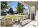 Small patio with view of street and neighboring homes at 12503 E Pacific Cir # E, Aurora, CO 80014