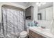 Clean bathroom with updated vanity and shower at 12503 E Pacific Cir # E, Aurora, CO 80014