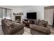 Living room featuring a fireplace and comfortable seating at 12503 E Pacific Cir # E, Aurora, CO 80014