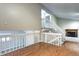 View of a staircase leading to an upper level, with a fireplace visible in the background at 251 S Carter Ave, Louisville, CO 80027