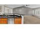 Kitchen with granite countertops and view into living room at 8653 E Dry Creek Rd # 1126, Englewood, CO 80112