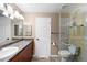 Primary bathroom with a double vanity and a separate shower at 8653 E Dry Creek Rd # 1126, Englewood, CO 80112