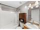 Clean bathroom with a shower/tub combo and vanity at 8653 E Dry Creek Rd # 1126, Englewood, CO 80112