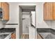 Convenient laundry room with stackable washer and dryer at 8653 E Dry Creek Rd # 1126, Englewood, CO 80112
