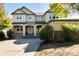 Two-story yellow house with a stone facade at 22264 E Frost Pl, Aurora, CO 80016