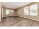 Bright and spacious living room with hardwood floors and neutral walls at 22264 E Frost Pl, Aurora, CO 80016