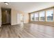 Spacious living area with hardwood floors and large windows at 22264 E Frost Pl, Aurora, CO 80016