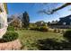 Spacious backyard with grassy area and landscaping at 22264 E Frost Pl, Aurora, CO 80016