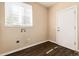 Laundry room with washer/dryer hookups and built in shelving at 22264 E Frost Pl, Aurora, CO 80016