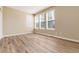 Bright bedroom with hardwood floors and multiple windows at 22264 E Frost Pl, Aurora, CO 80016