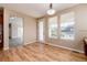 Bright kitchen nook with built-in workspace and backyard access at 22264 E Frost Pl, Aurora, CO 80016