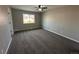 Large bedroom with grey carpet and ceiling fan at 17337 E Flora Pl, Aurora, CO 80013