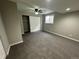 Basement bedroom with closet and carpeted floor at 17337 E Flora Pl, Aurora, CO 80013