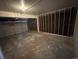 Unfinished garage with open space and concrete floor at 17337 E Flora Pl, Aurora, CO 80013