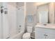 Clean bathroom with a tub, toilet and vanity at 12772 Boggs St, Parker, CO 80134