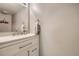 Updated bathroom with a white vanity and granite countertop at 7370 E Florida Ave # 1020, Denver, CO 80231