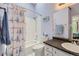 Clean bathroom, shower/tub combo, and granite countertop at 7370 E Florida Ave # 1020, Denver, CO 80231