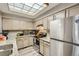 Kitchen with stainless steel appliances and granite countertops at 7370 E Florida Ave # 1020, Denver, CO 80231