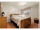 Basement bedroom with a double bed and wood floor at 408 W Jessup St, Brighton, CO 80601