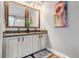 Bathroom features double vanity and granite countertop at 11203 Keota St, Parker, CO 80134