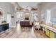 Two-story living room with hardwood floors at 11203 Keota St, Parker, CO 80134