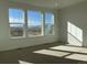 Spacious bedroom with large window offering panoramic views at 1278 Raindance Pl, Erie, CO 80516