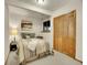 Cozy basement bedroom with wood closet doors at 23485 Bluestem Dr, Golden, CO 80401