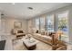 Spacious living room with large windows and ample natural light at 1701 S Newport Way, Denver, CO 80224