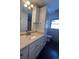 Bathroom with vanity, toilet and linen cabinet at 6601 E Exposition Ave, Denver, CO 80224