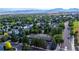 Aerial view of a residential neighborhood with various houses and landscape at 461 Tyler Ave, Louisville, CO 80027