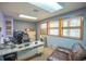 Modern office with a desk, comfortable seating, and ample storage at 461 Tyler Ave, Louisville, CO 80027