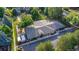 Aerial view of the building, playground, and surrounding neighborhood at 461 Tyler Ave, Louisville, CO 80027