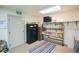 Classroom with bookshelves, a TV, and a learning rug at 461 Tyler Ave, Louisville, CO 80027